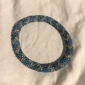 Blue and silver roll on bracelet